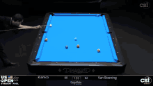 a pool table with a blue cloth that says diamond