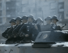 a group of soldiers are lined up in a row