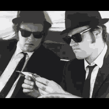The Blues Brothers Reading GIF - The Blues Brothers Reading GIFs