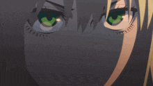 a close up of a girl 's face with green eyes and a smile