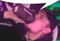 a man drinks from a bottle that says gaminate on it