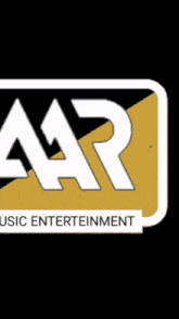 a man is standing in front of a sign that says aa music entertainment