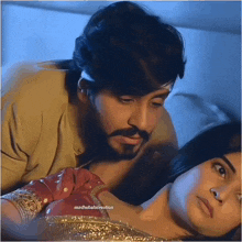 a man laying on a woman 's chest with the caption madhubalacreation
