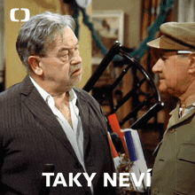 two men standing next to each other with the words taky nevi on the bottom right