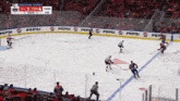 a hockey game is being played in a stadium with pepsi ads on the ice