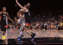a female basketball player with the number 23 on her shirt