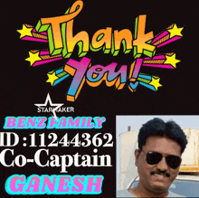 a man wearing sunglasses is standing in front of a thank you sign