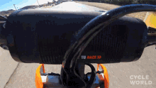 a bicycle with a speaker attached to it that says to race