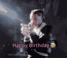 a man singing into a microphone with the words " happy birthday " written below him