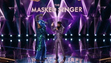 The Masked Singer Donny Osmond GIF - The Masked Singer Donny Osmond Nick Cannon GIFs