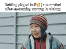 a young boy wearing a striped hat says getting pinged in # arena-chat after spamming my way to victory .