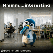 a penguin with a peoplehum shirt on