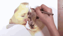 a person is drawing a picture of a woman and a lion cub