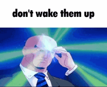 a cartoon of a man in a suit and tie with the words " do n't wake them up " on the bottom