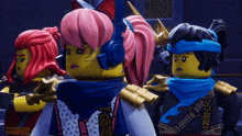 a group of lego characters standing next to each other with one wearing headphones