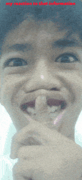 a close up of a person 's face with the words " my reaction to that information " on the bottom