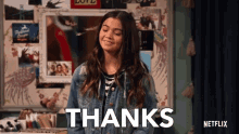 a girl in a denim jacket says " thanks "