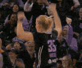a basketball player with the number 35 on her jersey