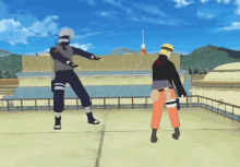 kakashi and naruto are dancing together on a rooftop .