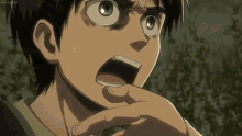 a close up of a person 's face with their mouth wide open