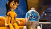 a cartoon girl is sitting on a couch next to a robot with three eyes .