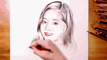 a person is drawing a picture of a girl with a pencil
