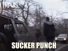 punching travis