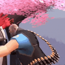 a man with a belt of bullets is standing in front of a cherry blossom tree and giving a high five .