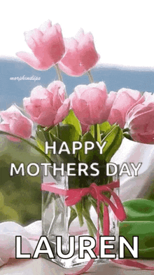 a bouquet of pink flowers in a vase with the name lauren on it .