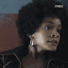 a close up of a woman 's face with the word max above her