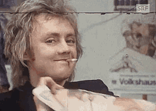 roger taylor queen drummer smile ripped newspaper