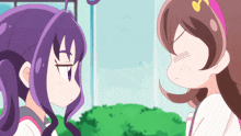 a girl with purple hair and a girl with brown hair