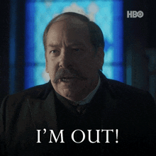a man with a mustache says " i 'm out " in front of a hbo logo