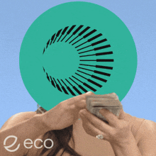 a woman is holding a stack of money in front of a green circle that says eco on it