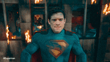 a blurred image of a wooden fence with #superman written on the bottom