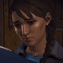 a close up of a woman 's face with a braid and earrings