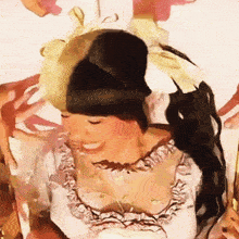 a painting of a woman in a white dress with ruffles on the sleeves