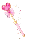 a pink and gold wand with a heart shaped crystal and a bow .