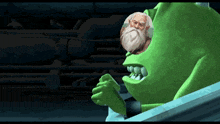 a green monster has a picture of an elderly man in it 's mouth