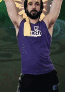 a man with a beard wearing a purple twitch tank top