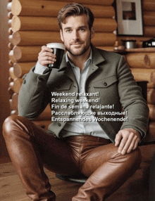 a man in leather pants sits at a table holding a cup of coffee and says weekend relaxant
