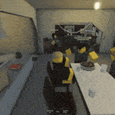 a group of lego people are sitting around a table