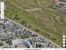 an aerial view of a city with a google map open