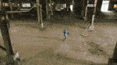 an aerial view of an empty building with a person in a robot costume