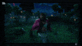 a pixelated image of a person with the letter x on the bottom