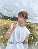 a man in a white tank top with the words taki de polloa written below him