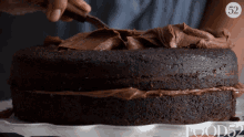 Spreading Chocolate Cake GIF - Spreading Chocolate Cake Icing GIFs