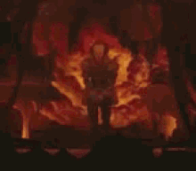 a group of people are standing in front of a fireplace .