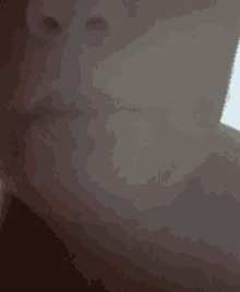 a close up of a person 's face with smoke coming out of it
