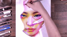 a person is drawing a woman 's face with a pencil that says ' sketch ' on it